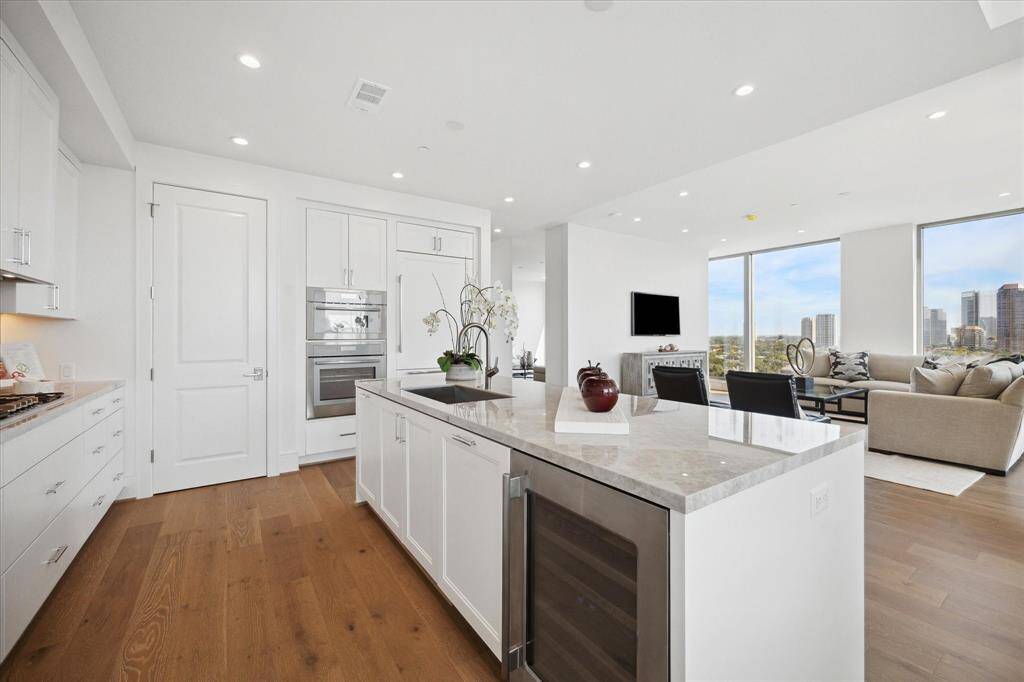 This chef's kitchen features sleek, clean lines for a stylish and functional cooking space.Enjoy cooking with Thermador and SubZero appliances.