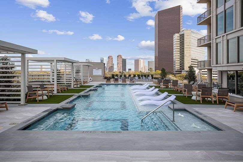 Enjoy breathtaking views of Tanglewood and the city skyline from the elevated sun deck, featuring a 67-foot lap pool.