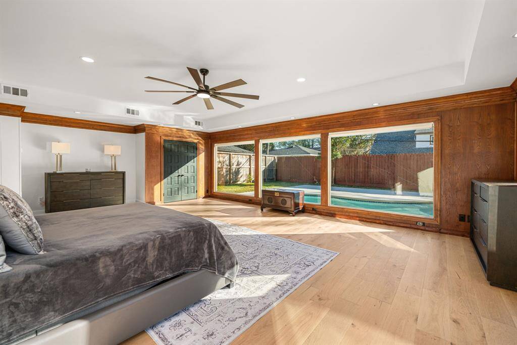 primary bedroom with pool view