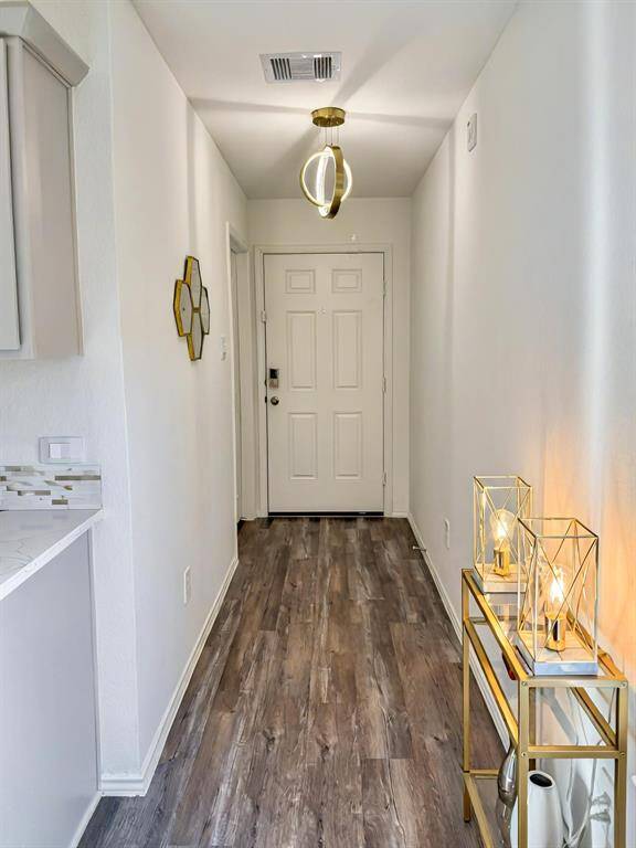 Home features built in home automation from a single app. Exterior doors have brushed nickel hardware. Double bore painted fiberglass raised panel front door