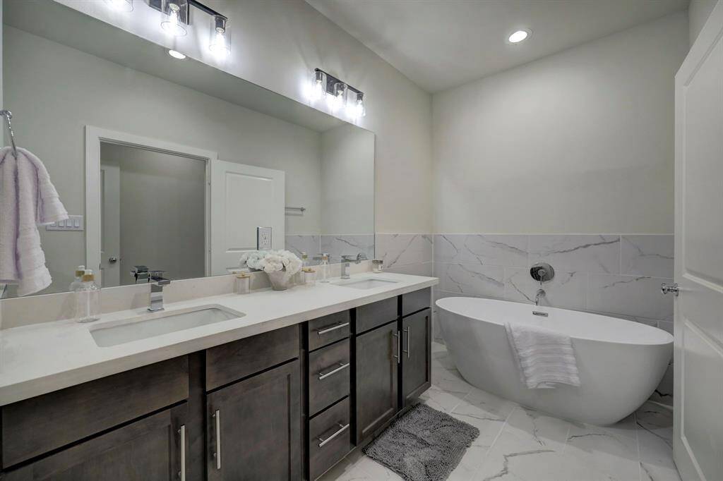 Featuring double sinks, a separate shower, a soaking tub, and a convenient tub/shower combo.