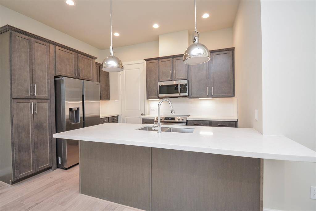 Delight in the luxury of a well-organized kitchen.