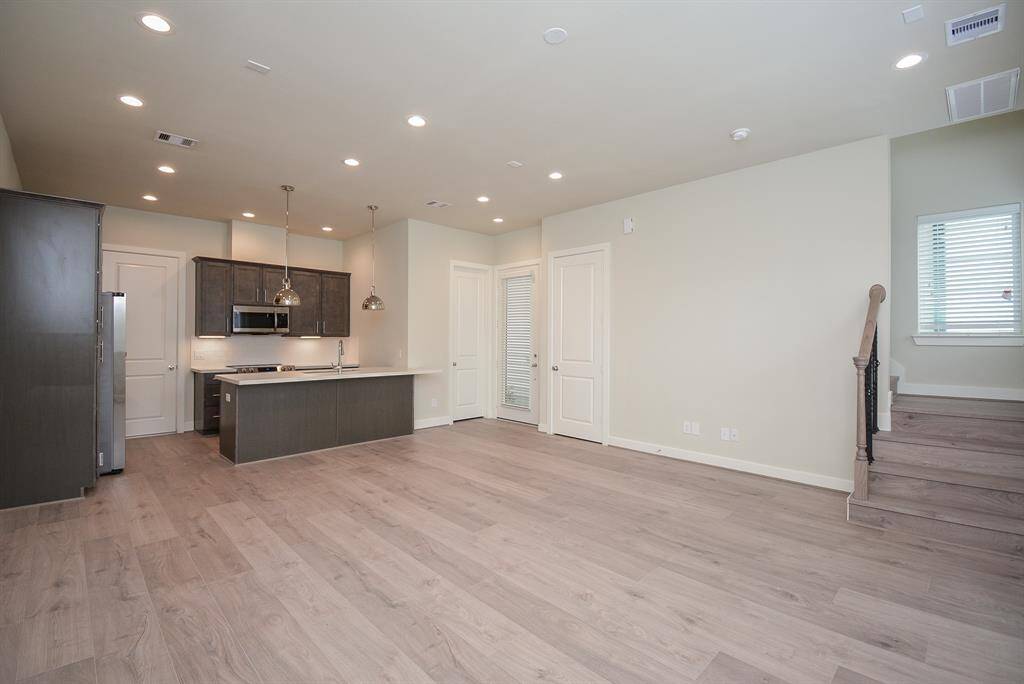 Open to the family room, this space forms an ideal setting for gatherings and cultivates a seamless flow for shared moments.