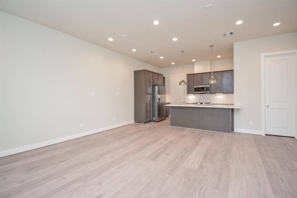 Open to the family room, this space forms an ideal setting for gatherings and cultivates a seamless flow for shared moments.