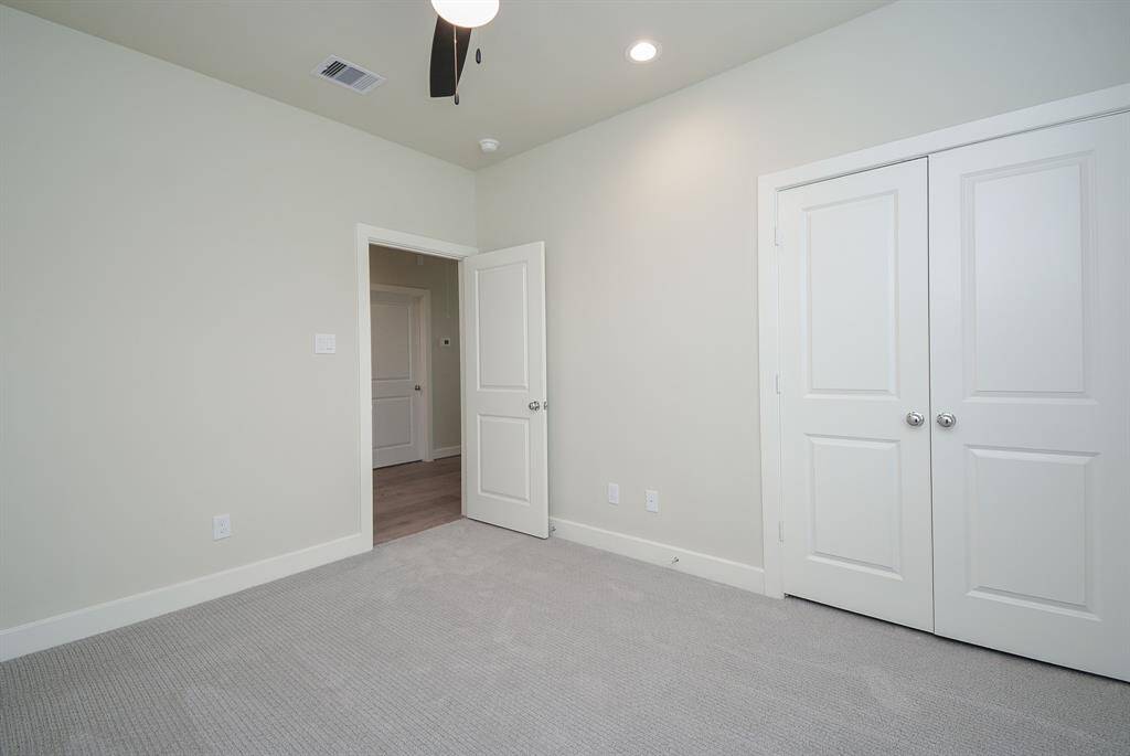 Indulge in the spacious comfort of the primary bedroom, complete with the added luxury of a walk-in closet.