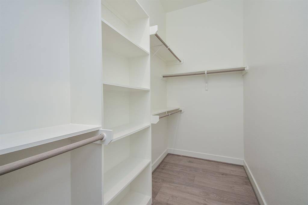 Indulge in the spacious comfort of the primary bedroom, complete with the added luxury of a walk-in closet.