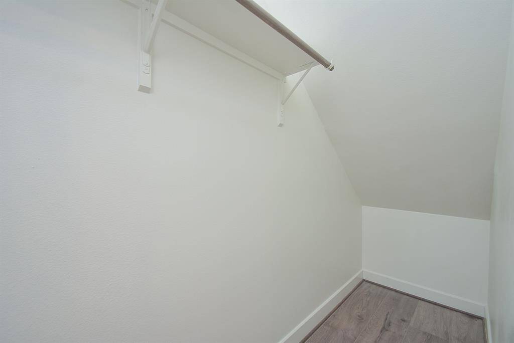 Indulge in the spacious comfort of the primary bedroom, complete with the added luxury of a walk-in closet.