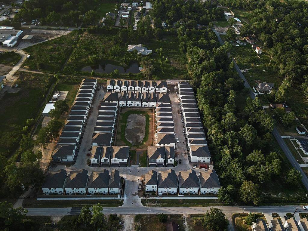 The residences in the subdivision present a captivating view from an elevated perspective.