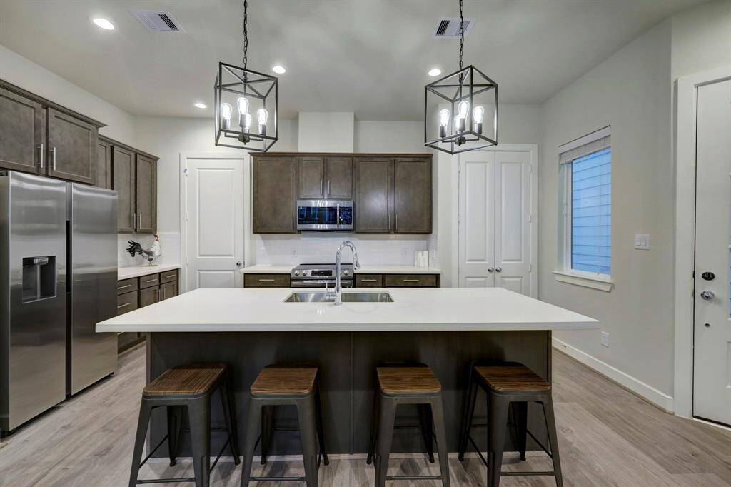 Delight in the luxury of a well-organized kitchen.
