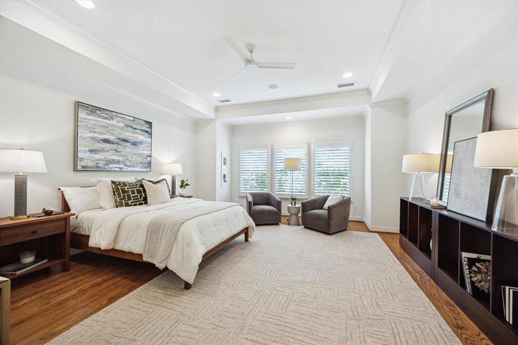 [Owner's Retreat ] Privately located in the back of home.  The sunlit alcove offers the perfect sitting area, framed by three large windows and ideal for morning coffee or reading.