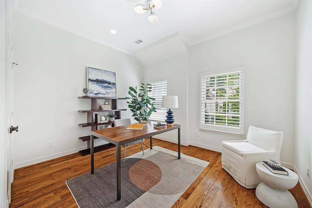 [Secondary Bedroom] One of the three secondary bedrooms - owners use this as a study - all bedrooms are generous in size with hardwoods and shutters.