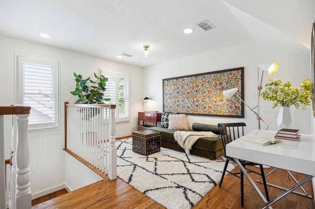 [Extra Room/5th Bedroom] On the third floor, the staircase landing transitions into a loft/fifth bedroom with a closet. Lot of options for this space - use it as a study, gym or game room.