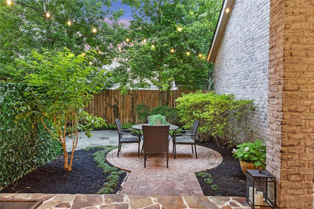 Your "outdoor" retreat! Patio is great for lounging and al fresco dining. The privacy of this backyard is outstanding.