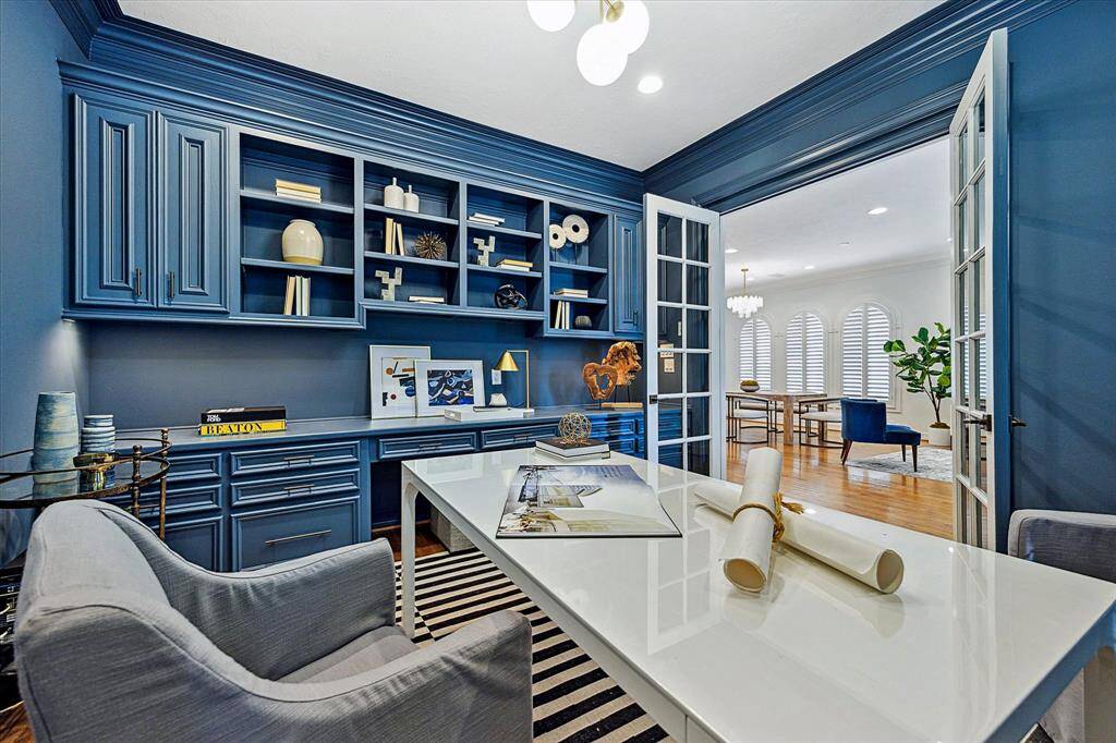 Library has a customizable layout: Spacious enough to accommodate a large desk and comfortable seating. Doors for privacy.