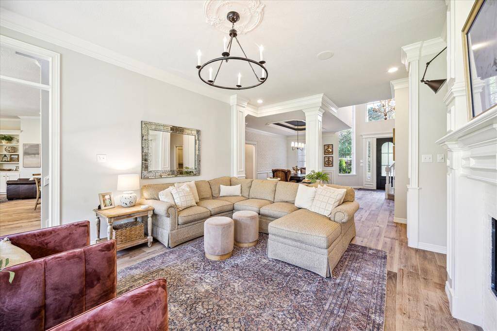 Flowing Floorplan – Formal living opens to dining, entry, and kitchen for seamless entertaining.