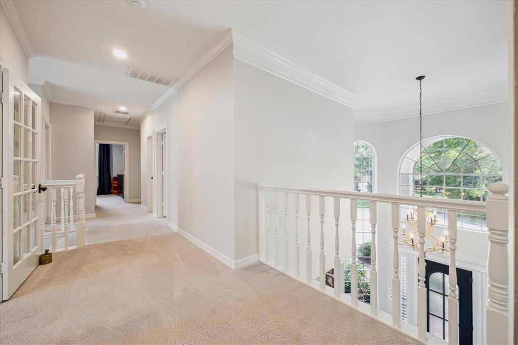 Upstairs Landing – Light-filled top of stairs opens to the game room and bedrooms.