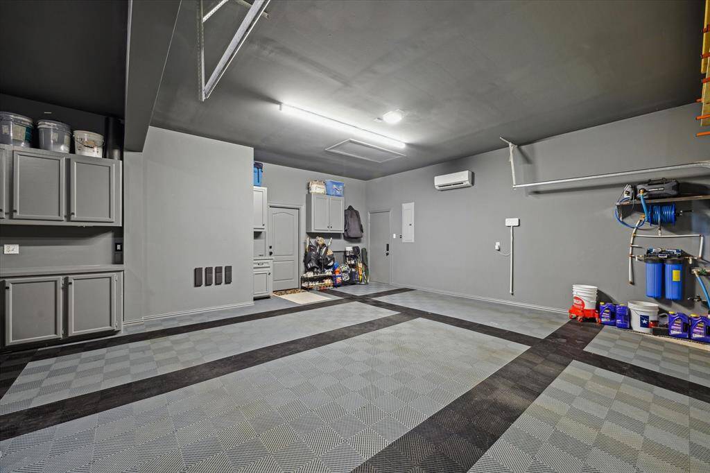 Upgraded Garage – Features mini split A/C, pressure washer system, and abundant storage.