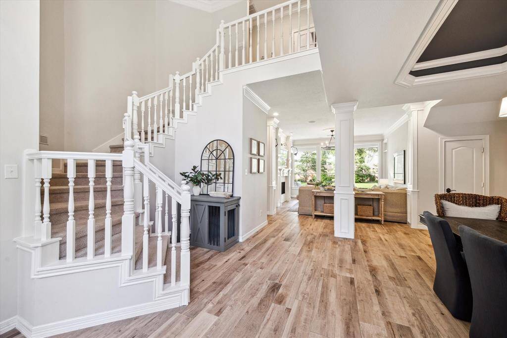 Warm Welcome – Entry flows into the spacious formal living with views straight through the home.