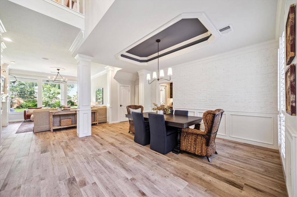 Elegant Entertaining – Formal living and dining rooms showcase traditional details and generous space.