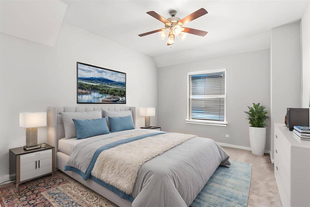 Bedroom 4 overlooks the side of the home. This rendering shows ideal furniture arrangement for this room as a sleeping space.