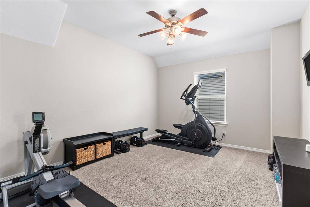 Bedroom 4 is currently being used as a fitness studio.