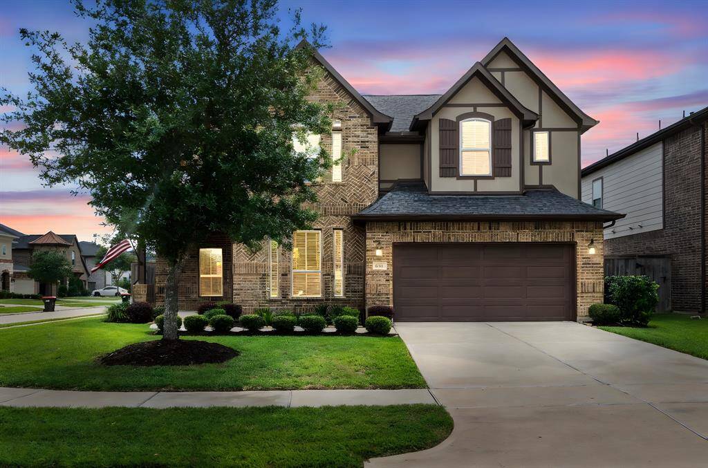 Imagine pulling into the driveway after a long day and being greeted by this welcoming front elevation. Welcome Home to 6303 Grand Dirft Court.
