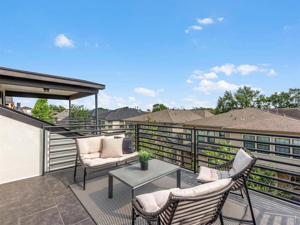 The patio with stylish seating space offers a range of options.
