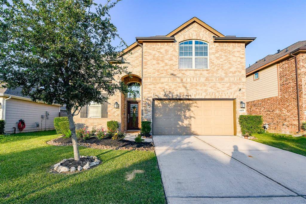Meticulous exterior maintenance adds to the bright, sophisticated curb appeal of this beautiful 2-story brick beauty; with attached garage, pictured here, above a long, roomy driveway.