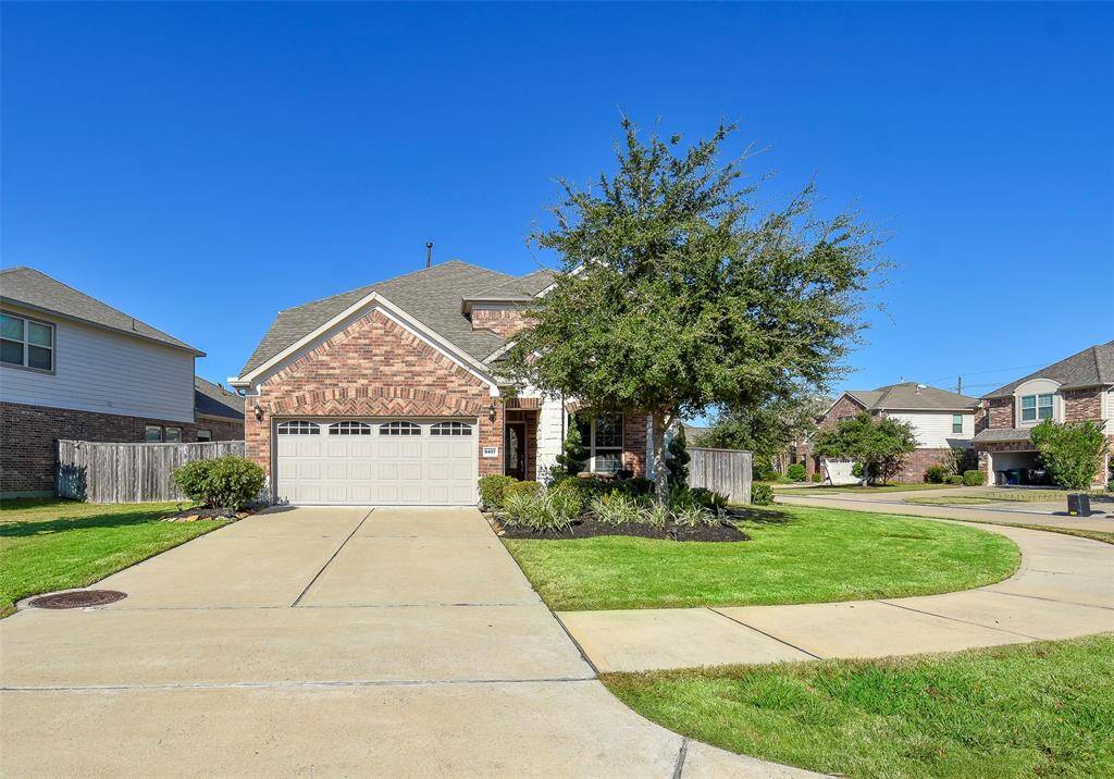 Spacious corner lot with sprinkler system.