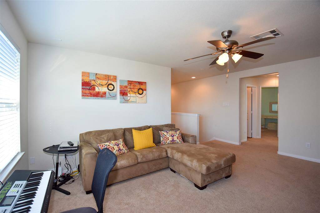 Another view of this conveniently located game room.