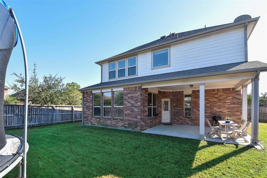 Big backyard great space for outdoor activities and entertainment.