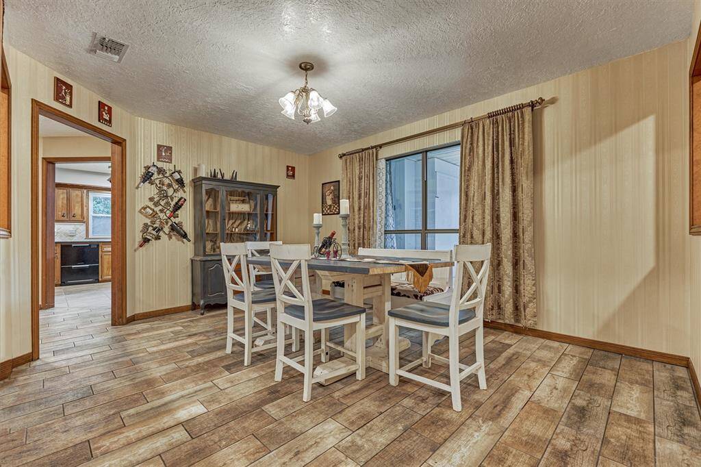 Formal Dining Room w/large window and entry to kitchen