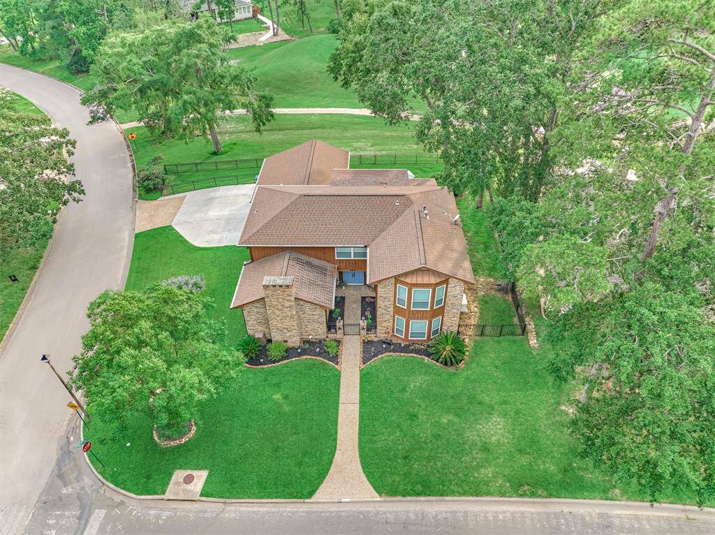 Corner Lot 2 story home nestled on over a quarter acre lot