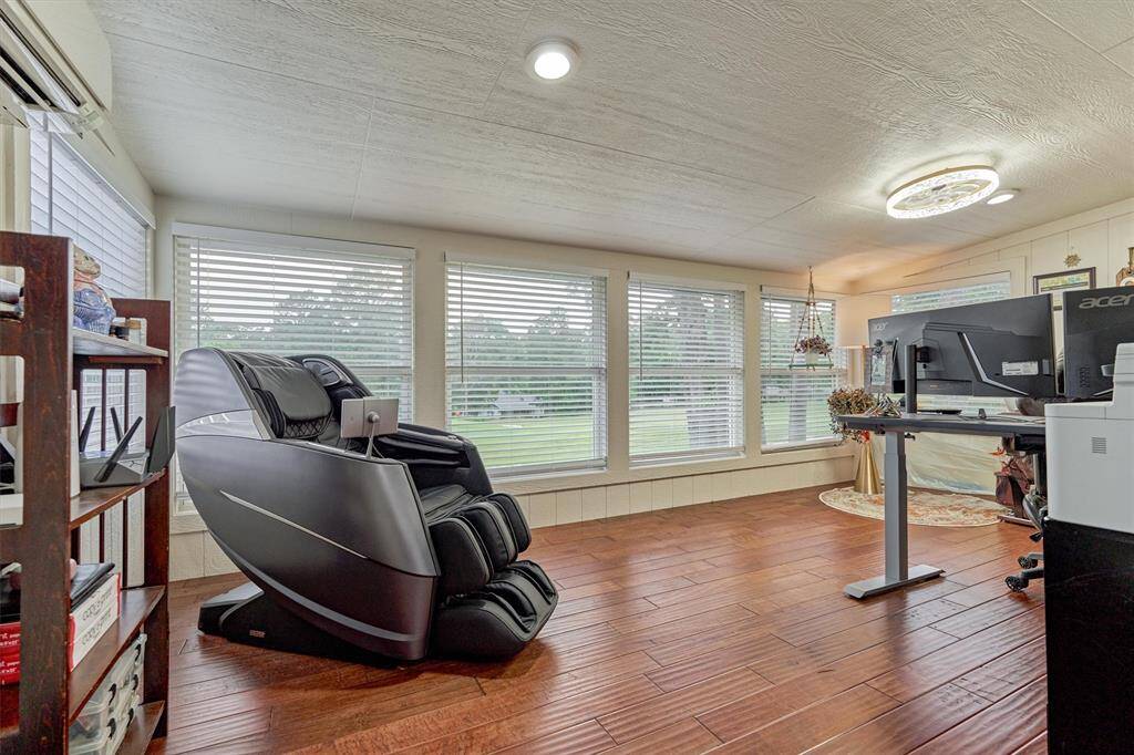 Upstairs flex room overlooking the golf course! Great playroom, sitting room, craft room, or study