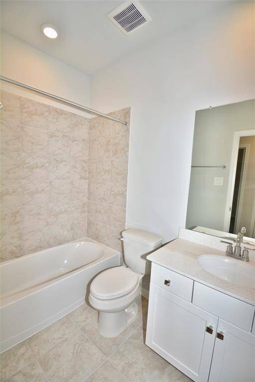 The secondary bathroom features a shower/tub combo!
