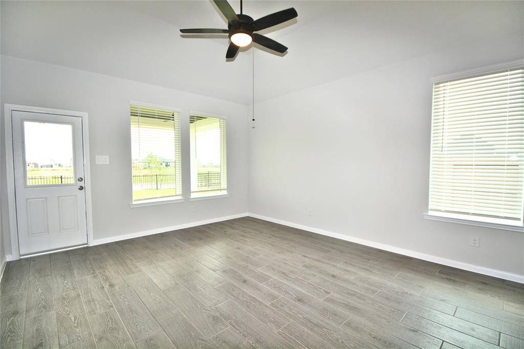 A view of the living room, plenty of natural light beams through!