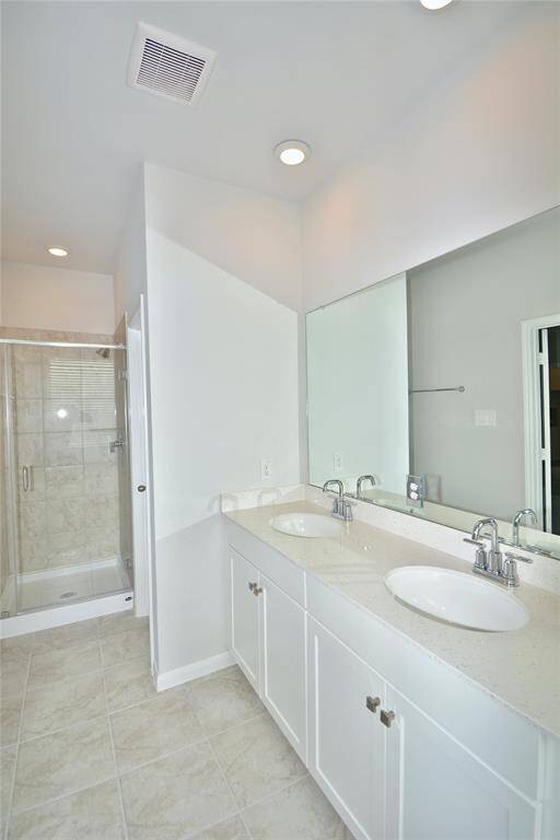A view of the standing shower in the primary bathroom!