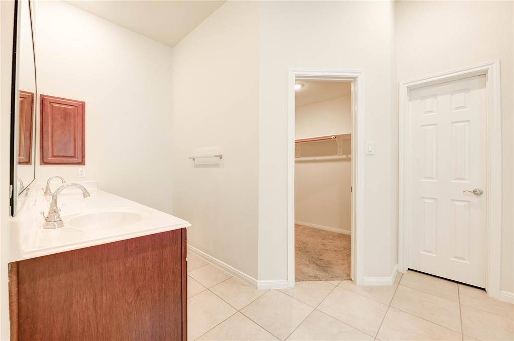 ensuite entrance with walk-in closet