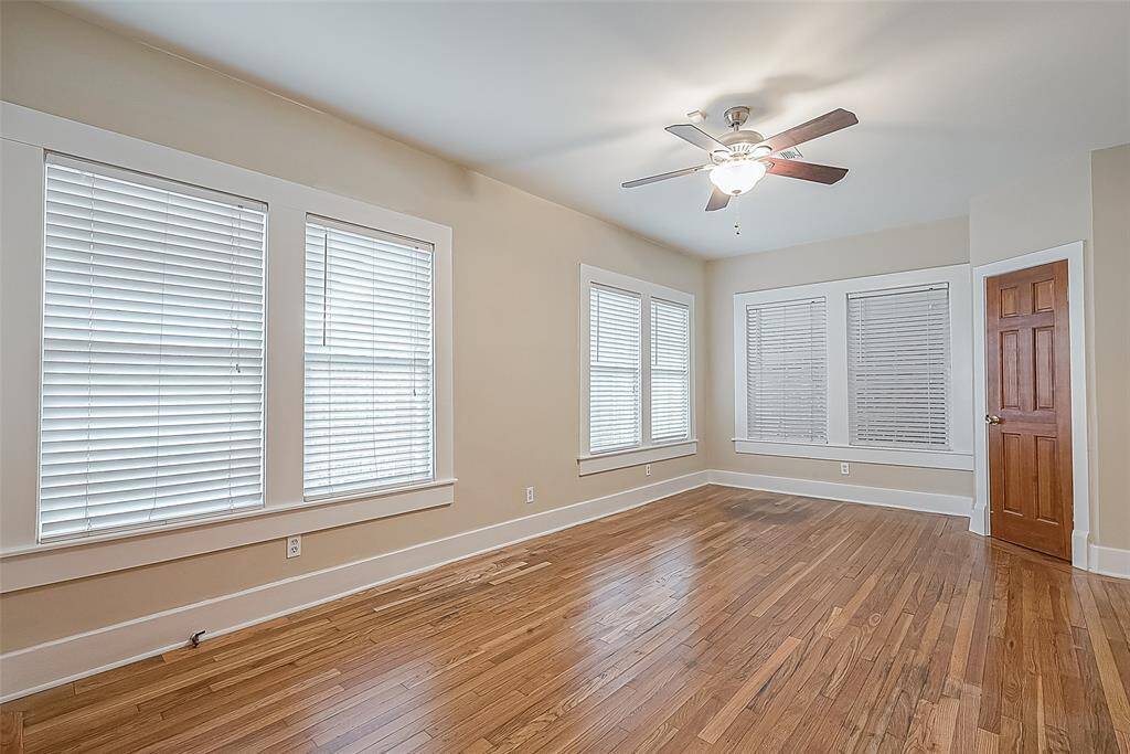 This is the primary bedroom suite -- super large! The door in the background on the right goes to the primary half bath.