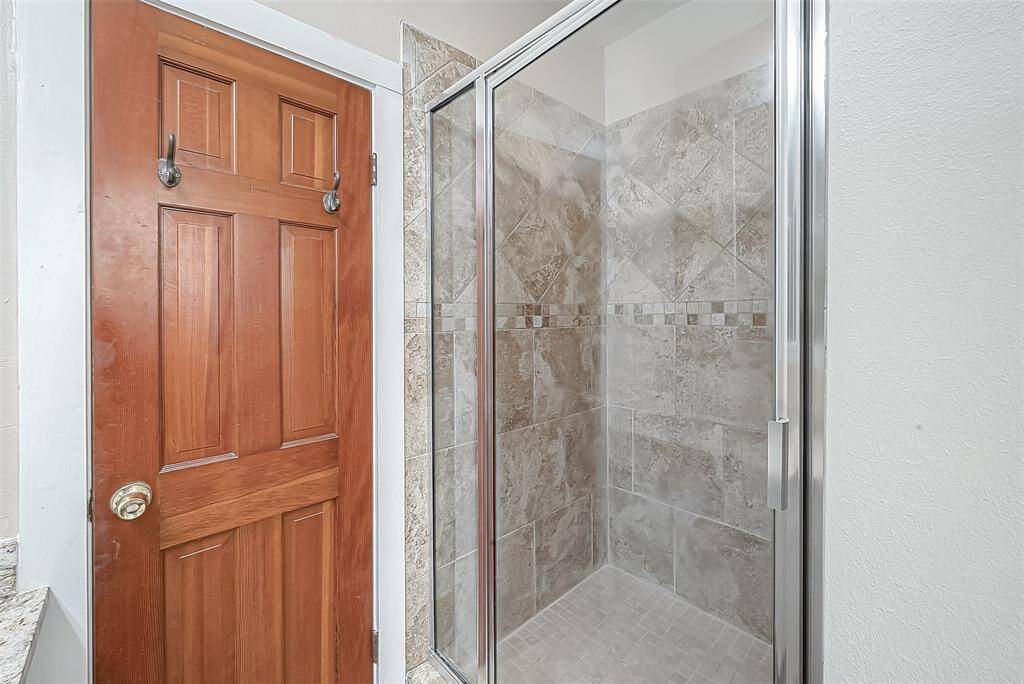 Attractively tiled shower!