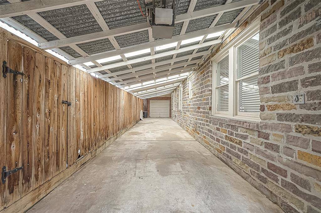 Access into the house can be via the front porch OR a back door that leads into the laundry room and kitchen.