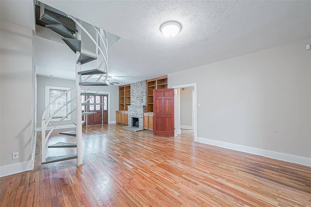 From the kitchen, looking back toward the front entry.