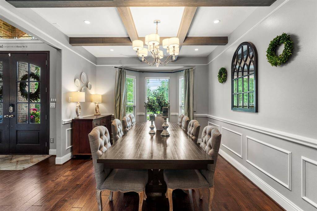 The room is enhanced by thecaptivating chandelier.