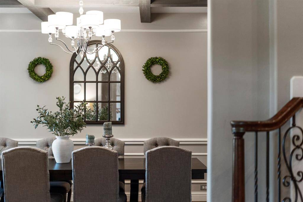 The room is enhanced by thecaptivating chandelier.