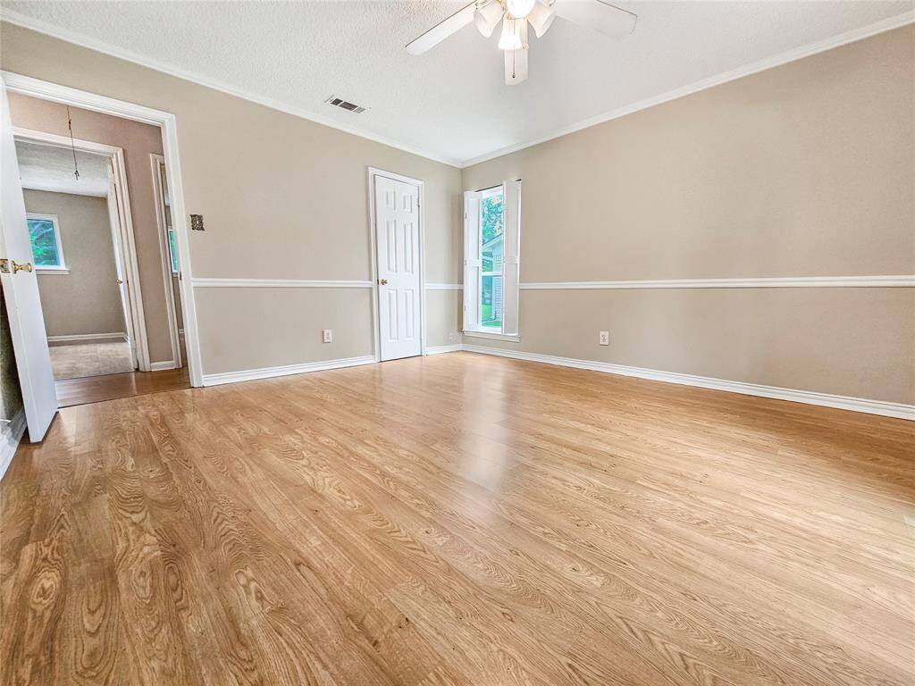 Primary Bedroom with Plenty of Natural Light and Walk-In Closet