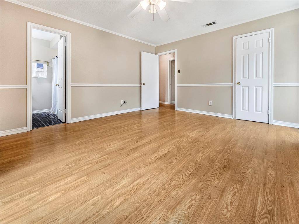 Primary Bedroom with plenty of Natural Light and En Suite