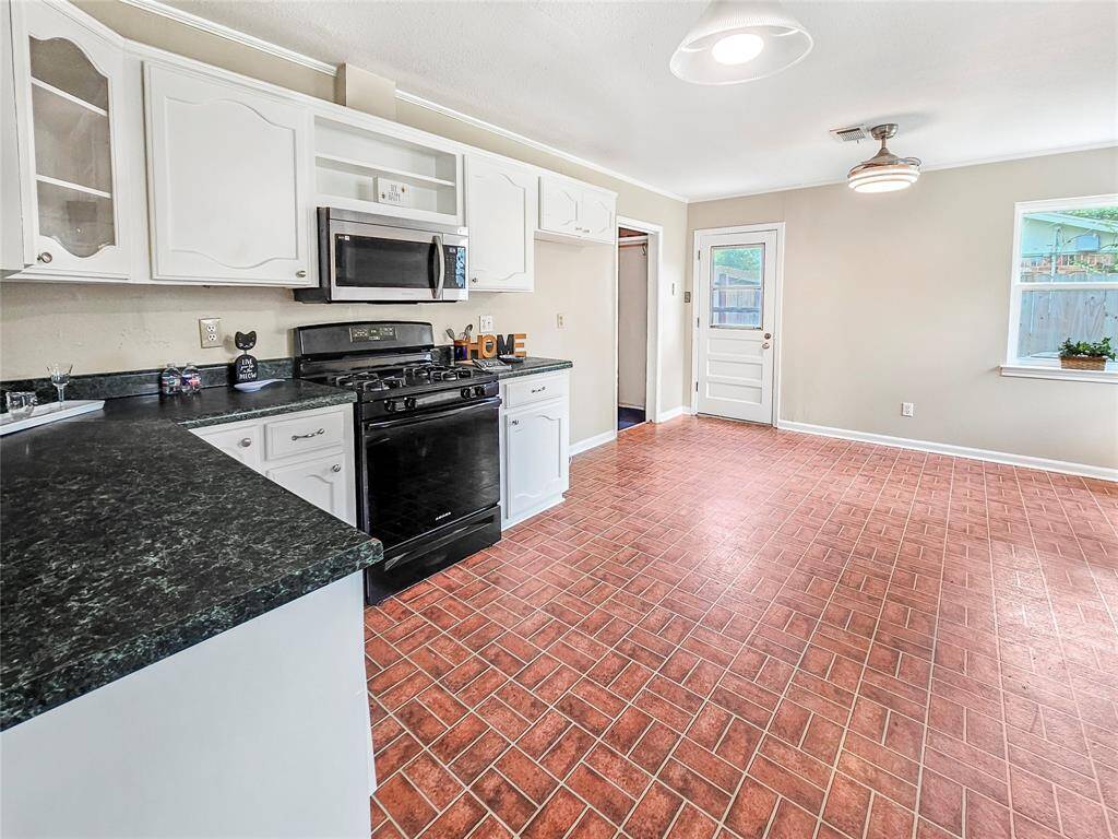 Open Kitchen and dining area with plenty of counterspace and storage. Customizable Walk-in Pantry area.