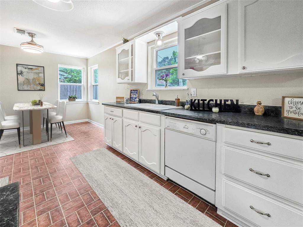 Open Kitchen and dining area with plenty of counterspace and storage. - VIRTUALLY STAGED