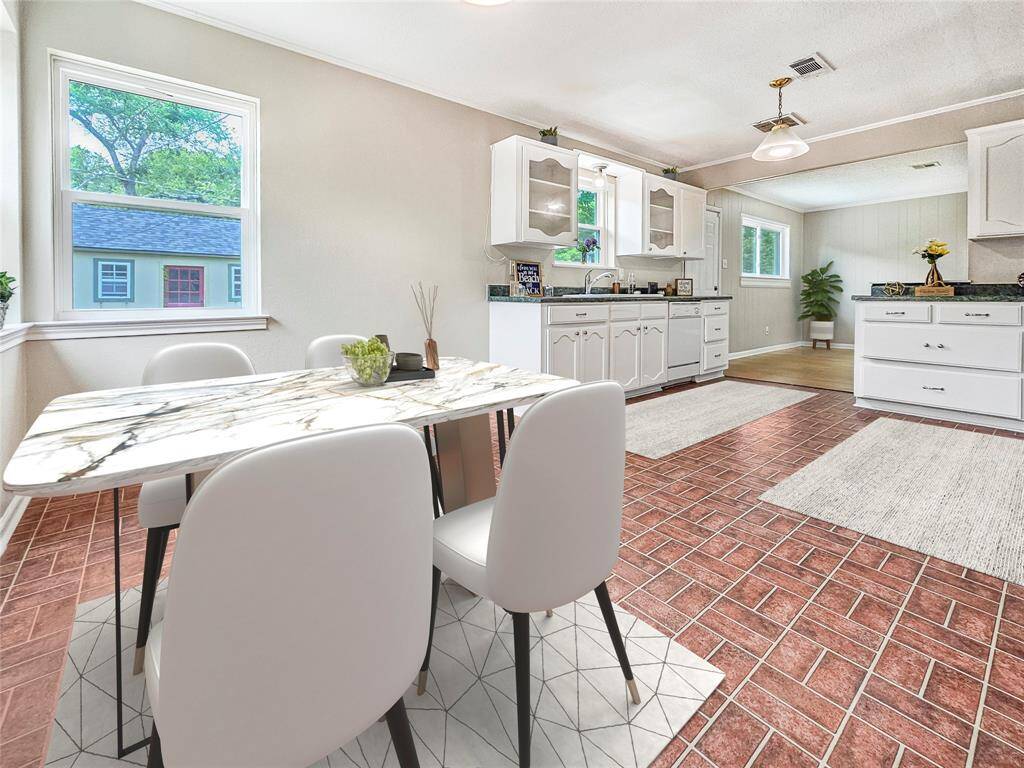 Open Kitchen and dining area with plenty of counterspace and storage - VIRTUALLY STAGED