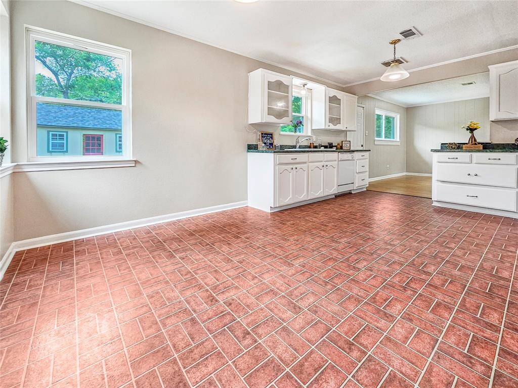 Open Kitchen and dining area with plenty of counterspace and storage